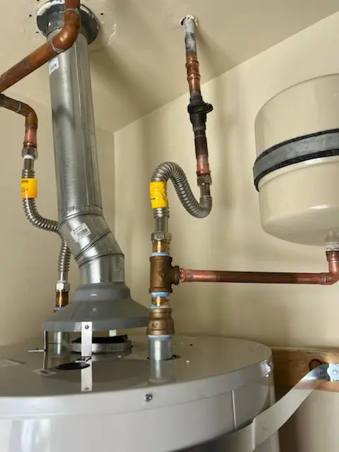 Water heater installation and plumbing repair in West Woodstock